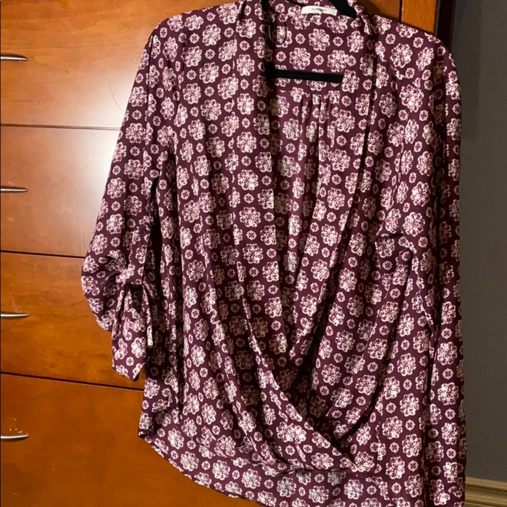 Flattering wrap shirt with option to cuff sleeves.
